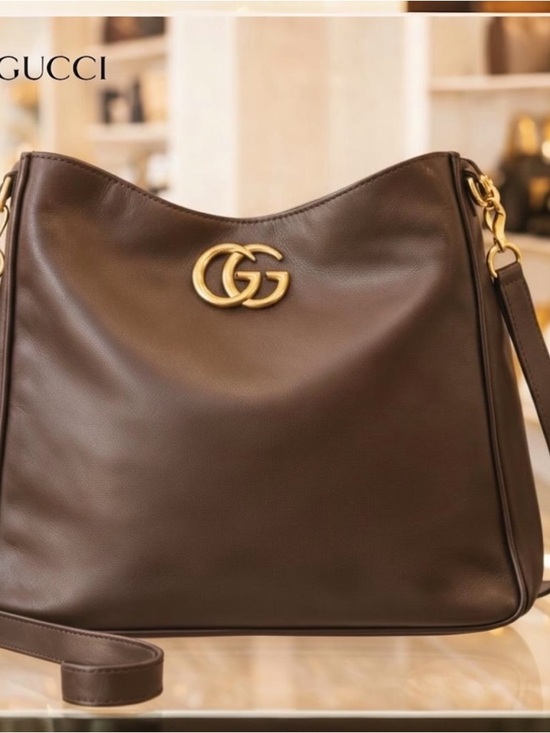 Gucci Handbags - AUTHENTIC GUCCI HOBO BAG IF GODIVA MADE HANDBAGS THIS IS DARK CHOCOLATE.